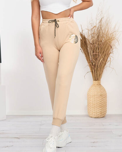 Pantaloni de trening de damă bej - Îmbrăcăminte